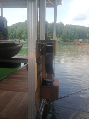 side view of lake installed automatic feeder